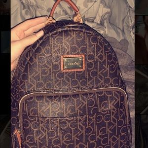 Brown and tan Calvin Klein small Back Pack